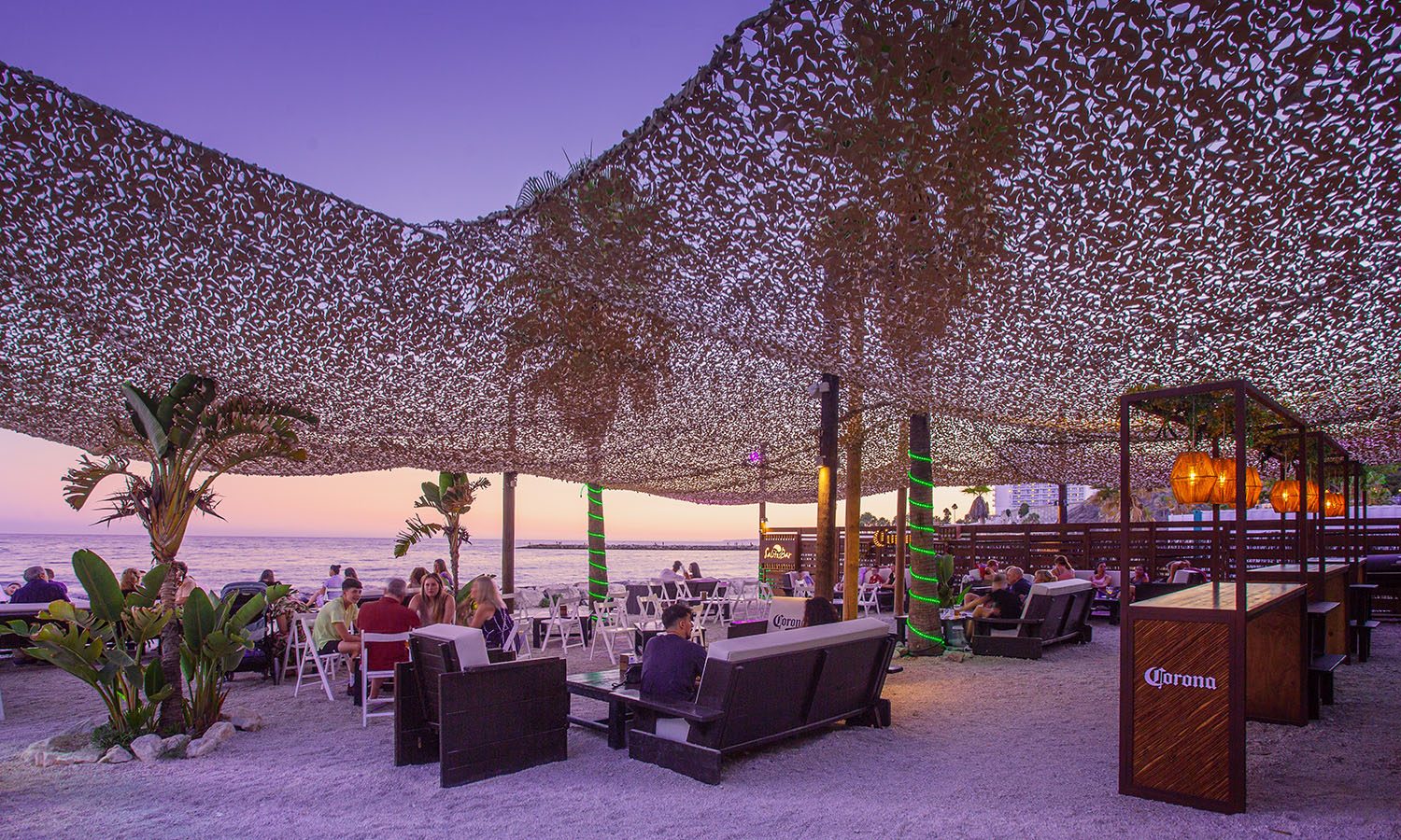 There is no better place to enjoy an after-dinner drink by the sea